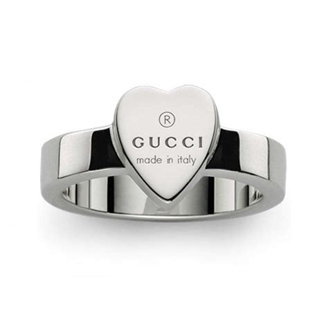 gucci trademark ring with heart pendant|gucci heart and cross ring.